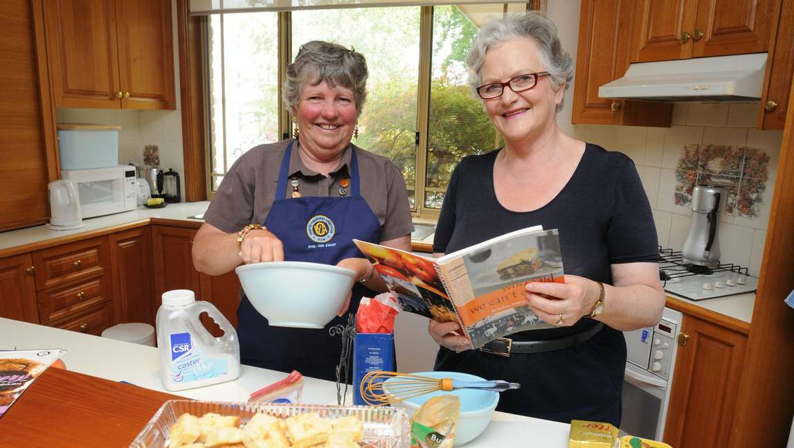 ORANGE: Roslyn Bensch and Deborah Marr cook up a storm for the Central Western Daily’s new magazine My Recipe Rules. Photo: STEVE GOSCH 0305sgcook2