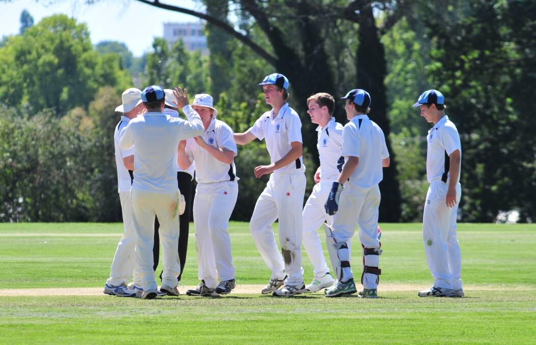 CRICKET: Kinross celebrate another CYMS scalp in Saturday's ODCA first grade game at Kinross. Photo: JUDE KEOGH