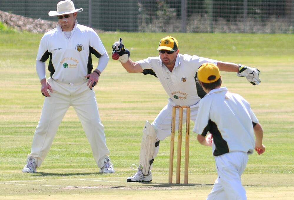 CRICKET: Orange CYMS' Rich McFarlane tries to glove one in ODCA lower grade action this weekend. Photo: STEVE GOSCH
