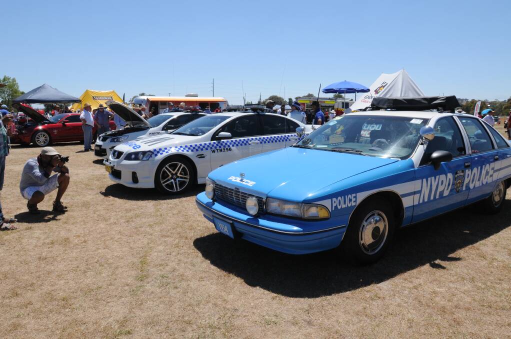 Old and new, foreign and domestic police cars at the Gnoo Blas Classic on Saturday. Photo: STEVE GOSCH