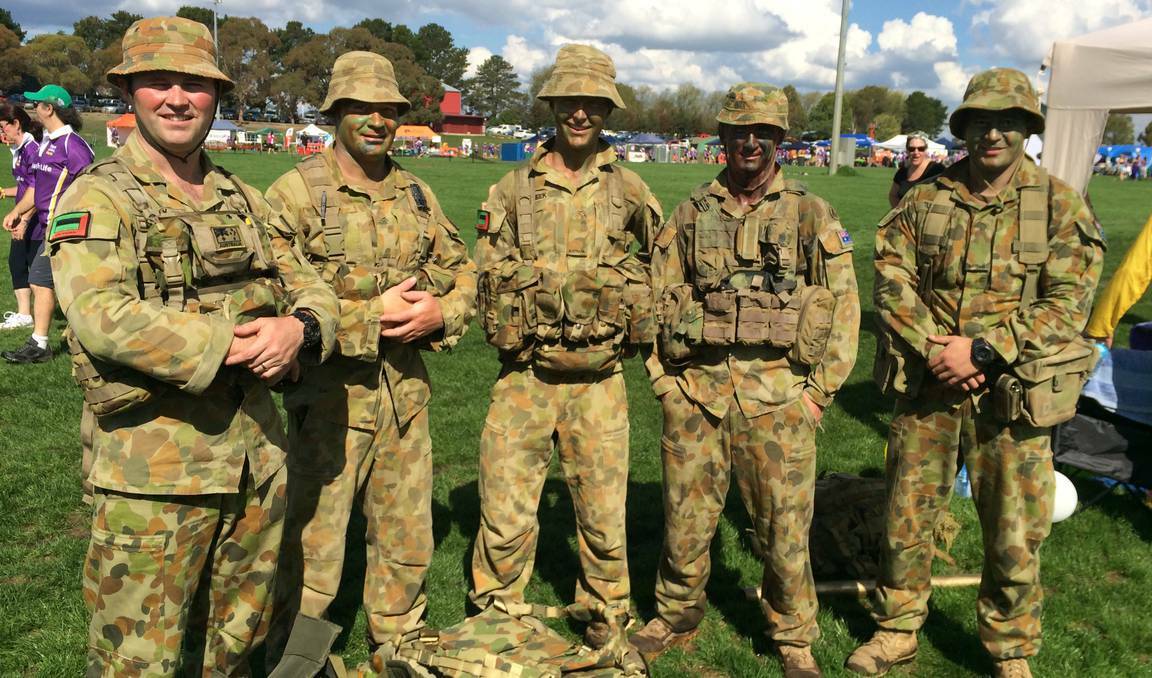 ORANGE: Lieutenant Michael Kelly, Private Charles Dunlop, Private Ben Meek, Private James Sutherland and Private Kenneth Turnbull from the 1/19 Royal NSW Regiment Relay for Life team. Photo: CLARE COLLEY 0308ccrelay2
