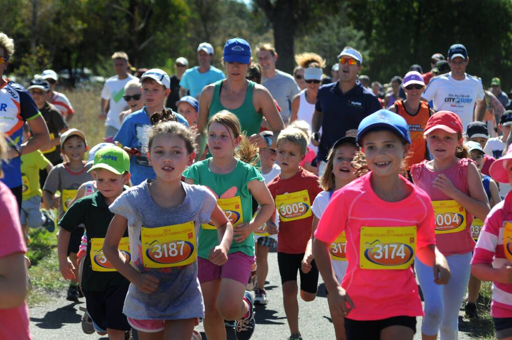 RUNNING RIOT: Competitors came from far and wide to compete in this weekend's Colour City Running Festival. Photo: STEVE GOSCH