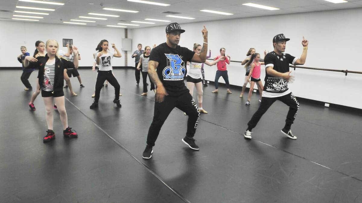 LEADING FROM THE FRONT: Former Justice Crew member Emmanuel Rodrigues and dance instructor Wyllis Maihi ran workshops for young dancers at Stepping Out Dance Factory in Orange on Sunday. Photo: JUDE KEOGH