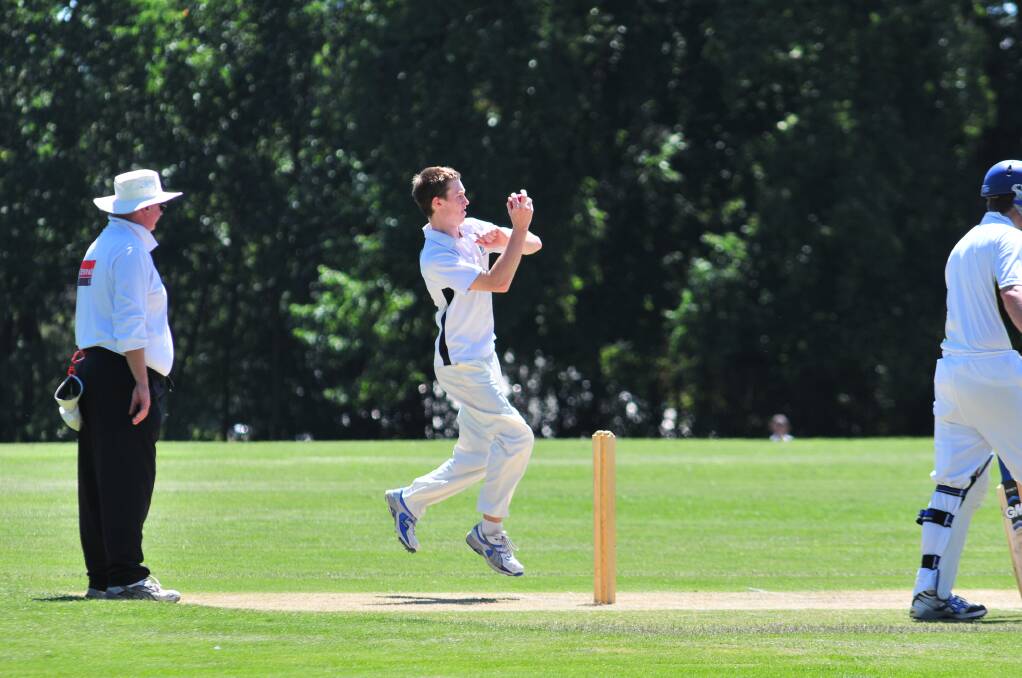 CRICKET: Rowan Wilson bowls against CYMS in Saturday's ODCA first grade fixture. Photo: JUDE KEOGH