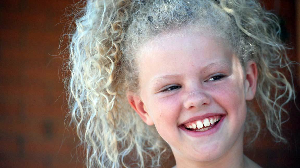 CANOWINDRA: With honey tendrils tangled in her tiara, eight-year-old Kaelyn Coker from Panuara is following her dream of one day becoming Miss Universe halfway across the world.