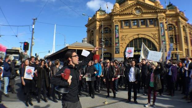 UP IN ARMS: Protesters rally against the Australian Border Force in Melbourne. Photo: THE AGE