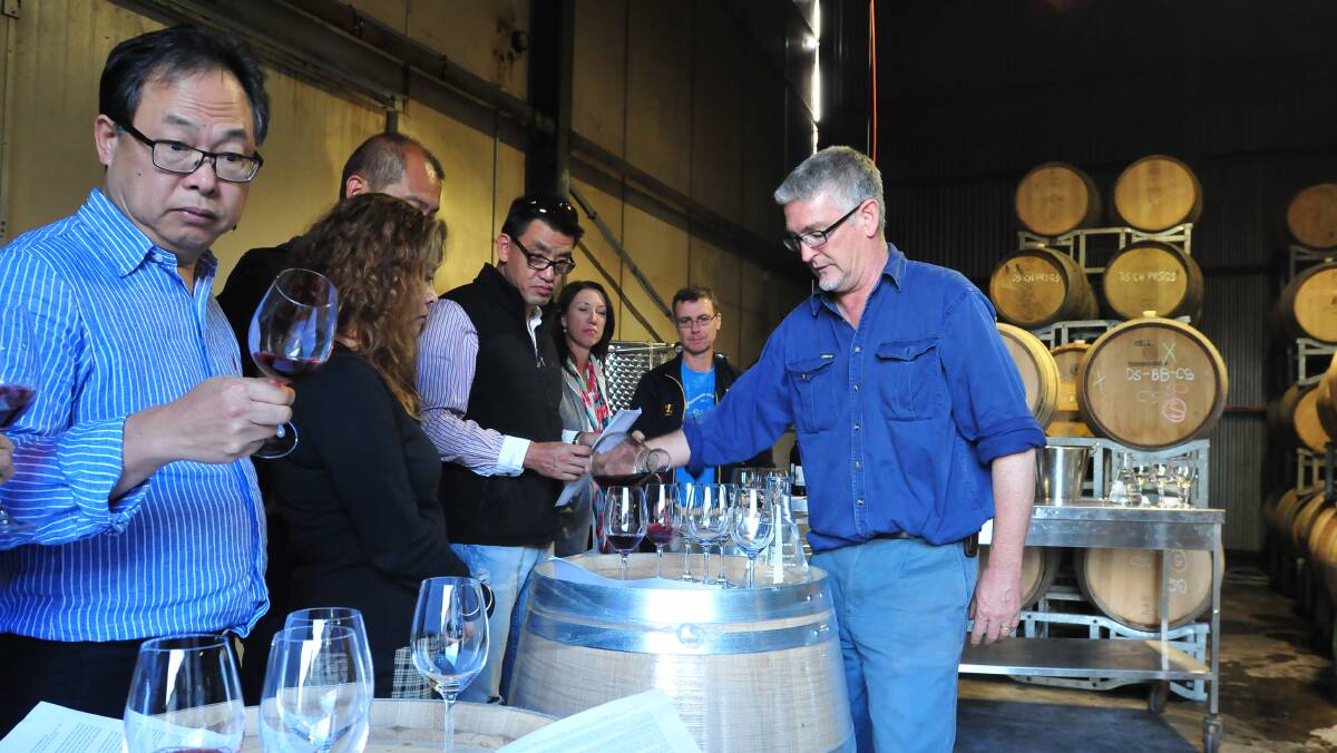 BARREL TO BOTTLE: De Salis winemaker Charlie Svenson. Photo: JUDE KEOGH