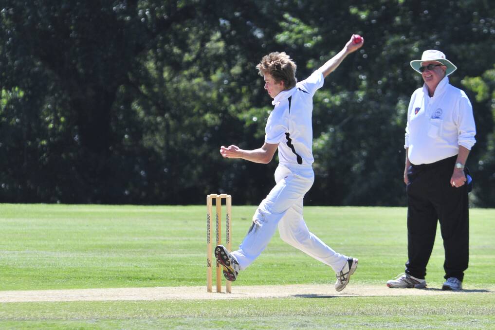 CRICKET: Kinross bowler Hugh Britton in action against CYMS in ODCA first grade action on Saturday. Photo: JUDE KEOGH
