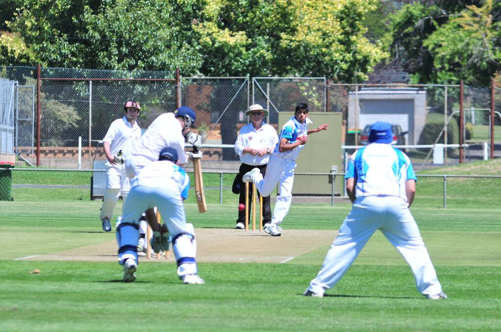 CRICKET: Waratahs' Adnan Arif sends one down in his side's ODCA first grade game against Centrals at Wade Park on Saturday. Photo: JUDE KEOGH