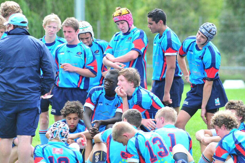WESTERN BOYS: The Western NSW team takes a break. Photo: JUDE KEOGH