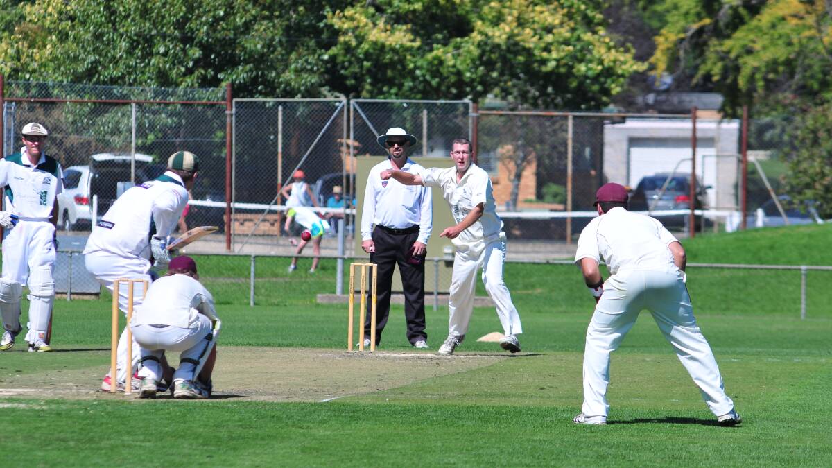 FIRST GRADE: Cavaliers Off spinner Brad Wright twirls one down during his side's win over Orange City at Wade Park. Photo: JUDE KEOGH