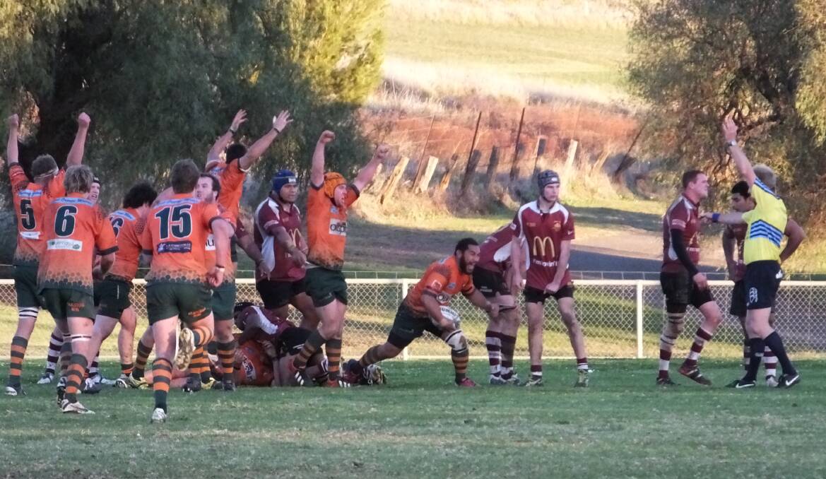 WILL HISTORY REPEAT?: In 2013 a last-minute Mesui Lemoto try got Orange City Lions across the line against Parkes Boars at Northparkes Oval. Will Saturday's round one clash end the same way? Photo: NICK MCGRATH