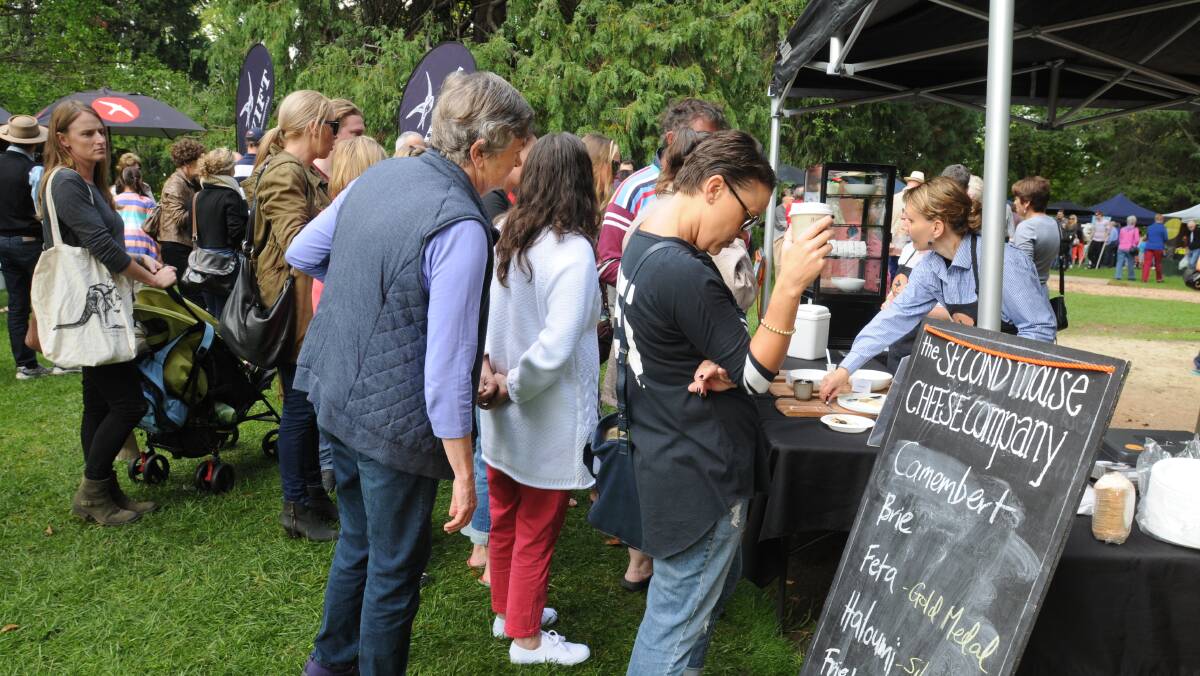 FULL STOMACHS: Crowds at Sunday's producer's markets in Cook Park. Photo: STEVE GOSCH