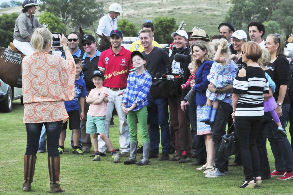 James Tobin and the sunrise crew pose for a photo with the onlookers. Photo: JUDE KEOGH