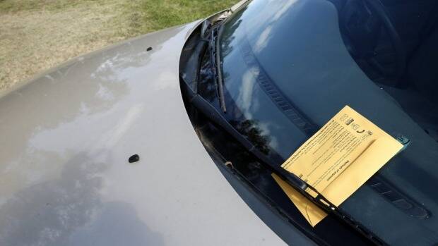 OUR SAY: A fine time to improve parking problems by enforcing the rules