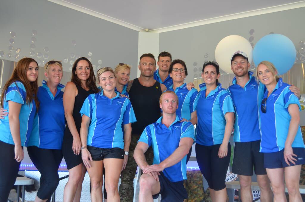 GATHER ROUND: The Commando with the staff of Integra Health and Fitness. Photo: NICOLE KUTER