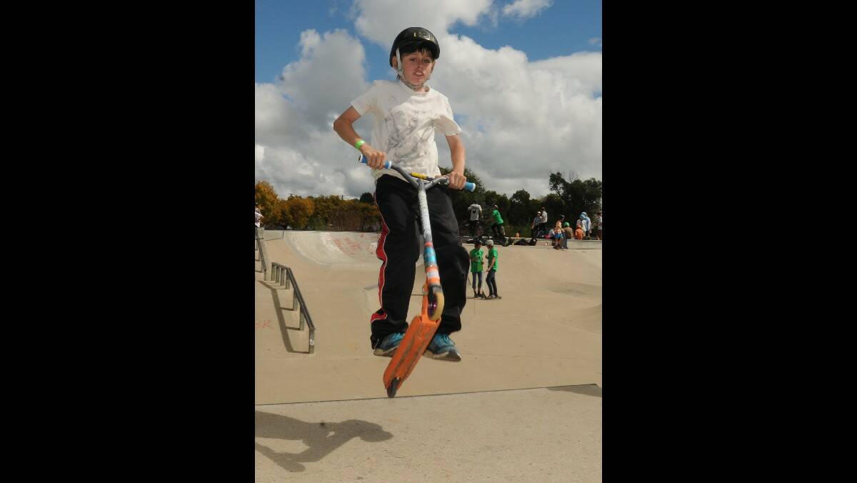 RAMPING IT UP: Jason Britt in the air at the John Lomas Skate Park on Saturday. Photo: STEVE GOSCH