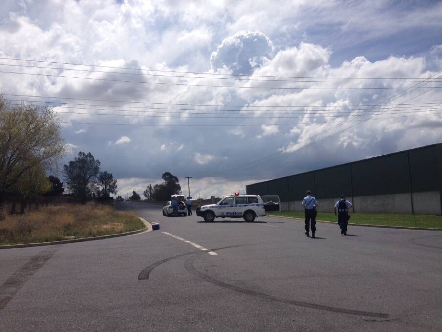 EMERGENCY: A police roadblock on Marshalls Lane in response to this morning's chemical spill. Photo: BRYANT HEVESI