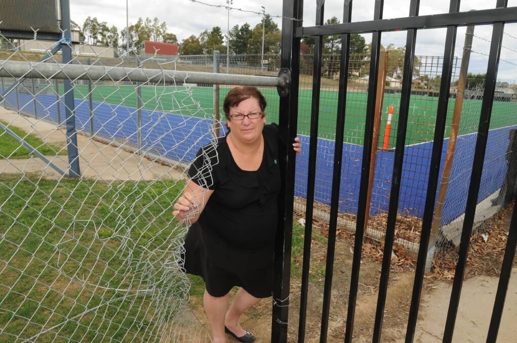 BEHAVIOUR BARRIER: Orange Hockey Incorporated president Michelle Stevenson fears ongoing vandalism and threats from people cutting through the hockey fields will scare away future carnivals in the lead up to July's state championships. Photo: STEVE GOSCH.