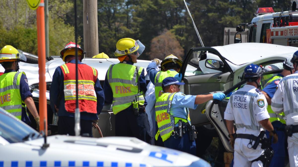 COLLISION: Police and emergency services were on the scene of a two-car collision outside Orange Hospital on Monday afternoon. Photos: NICOLE KUTER