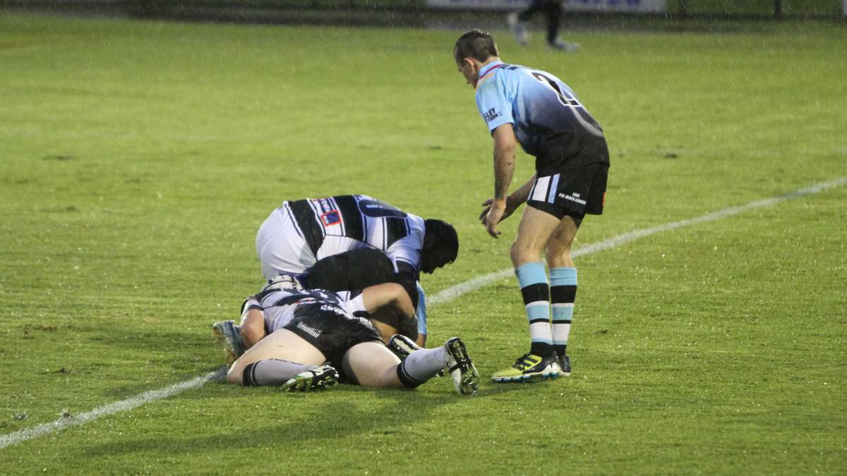 MAGPIES FALL: Cowra went down 12-10 to Tallbigeal Lakes United in Friday night's first round of the 2014 West Wyalong Knockout. Photo: DAISY HUNTLY