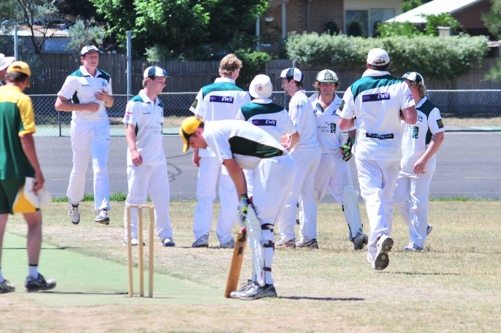 CRICKET: Orange City's centenary cup side celebrate a wicket against Orange CYMS in their ODCA game at Moulder Park on Saturday. photo: JUDE KEOGH