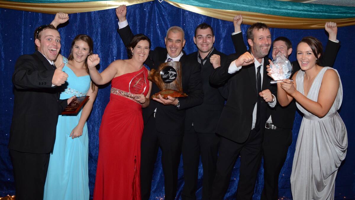 TOP HONOURS: Almighty Industries employees Josh Doulman, Maddie Osbourne-Gillette, Jenny Raffen, Todd Raffen, Peter Shannon, Noel Swain, Paul Williams and Edwina McDonald celebrate their success at the Banjo Business Awards. Photo: JUDE KEOGH 0212awards69
