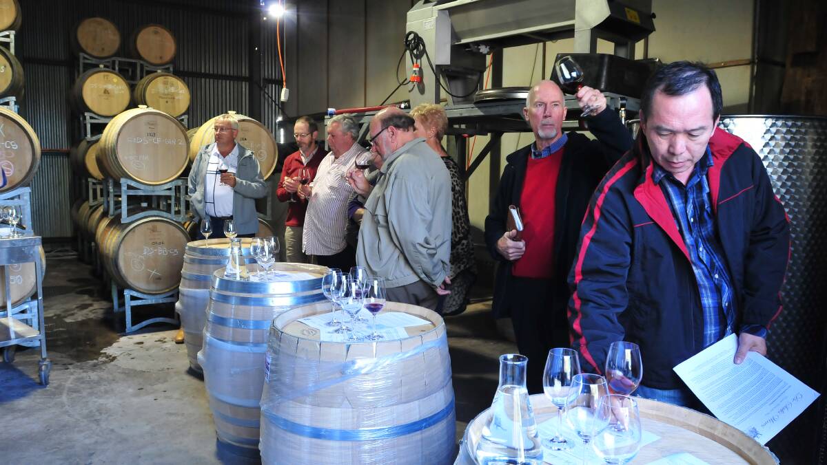 BARREL TO BOTTLE: There was an eager group looking to learn more about wine making at De Salis Wines. Photo: JUDE KEOGH