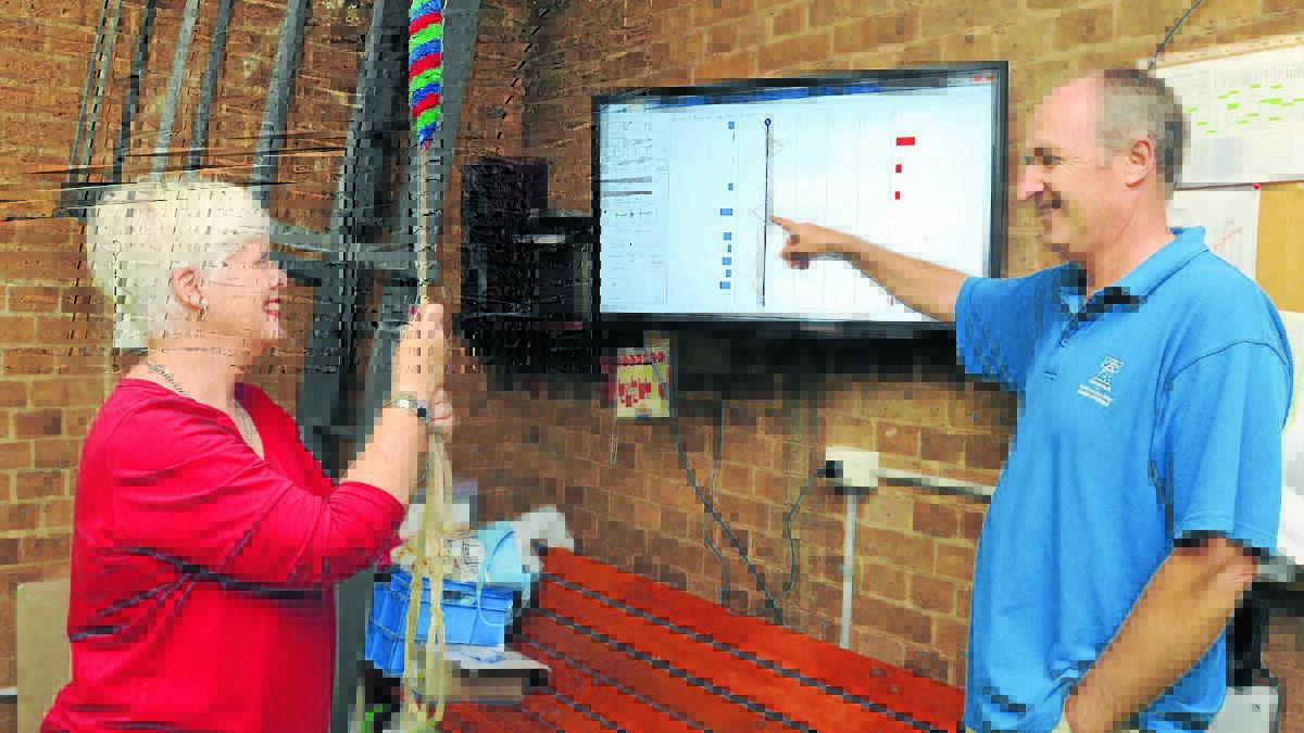 LEARNING THE ROPES: Holy Trinity Anglican Church bell tower captain Jennifer Derrick has her first training session with the Virtual Belfry simulator, developed by Tasmanian ringing teacher Doug Nichols. Photo: STEVE GOSCH                                                                              0121sgbells1

