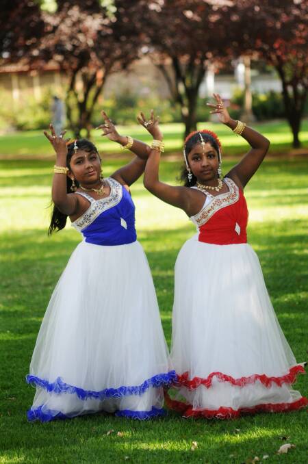 DIVINELY DIVERSE: Meera and Devika Nair practise their moves for their performance on Sunday.
Photo: STEVE GOSCH 0310sgharmony
