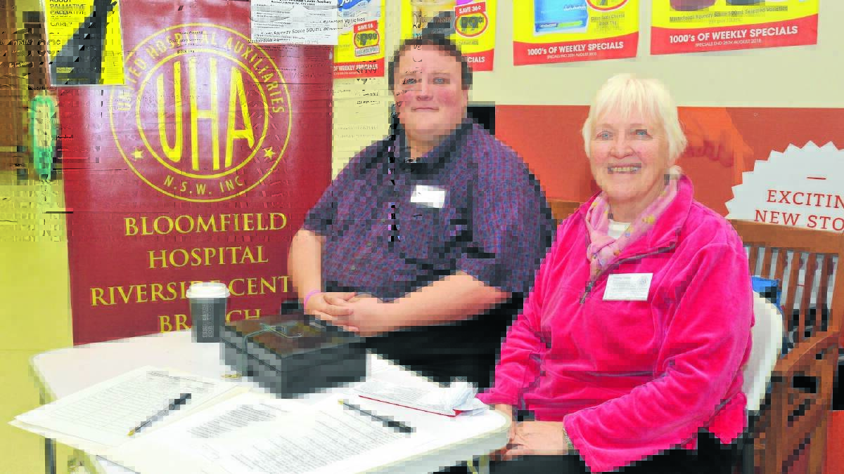 BETTERING RIVERSIDE: Peter and Margaret Balsom man one of the many raffle stands you’ll see in shopping centres during a major fundraiser for the Bloomfield Hospital Riverside Centre Auxiliary.
Photo: JUDE KEOGH 0821raffle2
