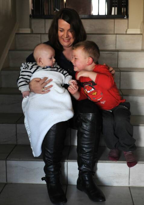 MORE OPTIONS FOR PARENTS: Nicole Munday, pictured with her sons Angus, 3 months, and Oscar, 4, says returning to work after maternity leave will bring with it a big bill for childcare. Photo: STEVE GOSCH