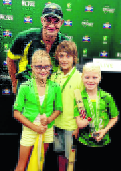 ONE TO REMEMBER: Bella, Hamish and Knox Gibson with Australian cricketer Shane Watson. Photo: CONTRIBUTED