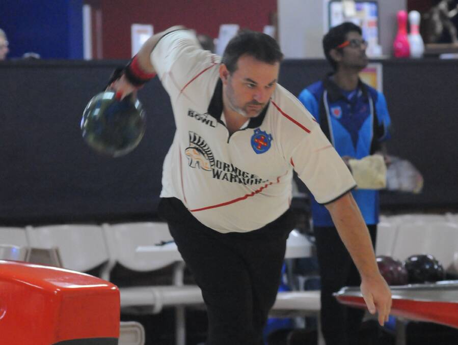 ON A ROLL: Ross Southwell had the leading average for the Orange Warriors in their State Tenpin Bowling League win over Gosford on Sunday.
Photo: JUDE KEOGH 0427tenpin1