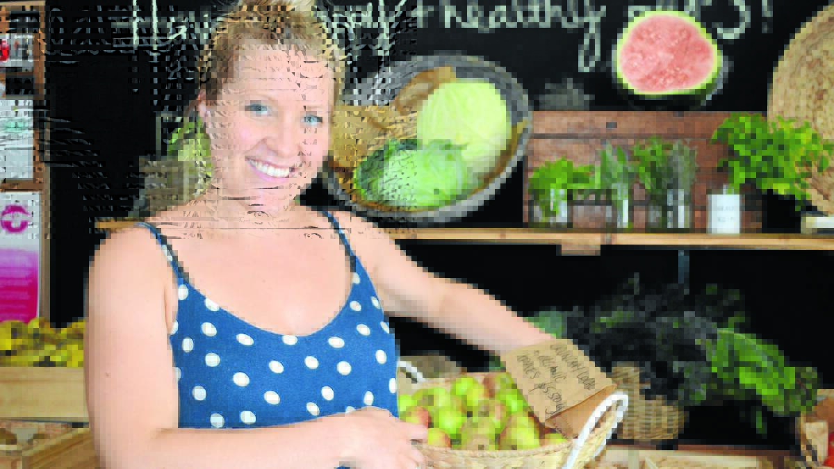 FOOD FOR THOUGHT: The Grocer and Co Organics co-owner Ellie Hampton says the recent food scares with frozen berries and tuna have shown the importance of thinking about where food comes from.
Photo: TANYA MARSCHKE 0227food1
