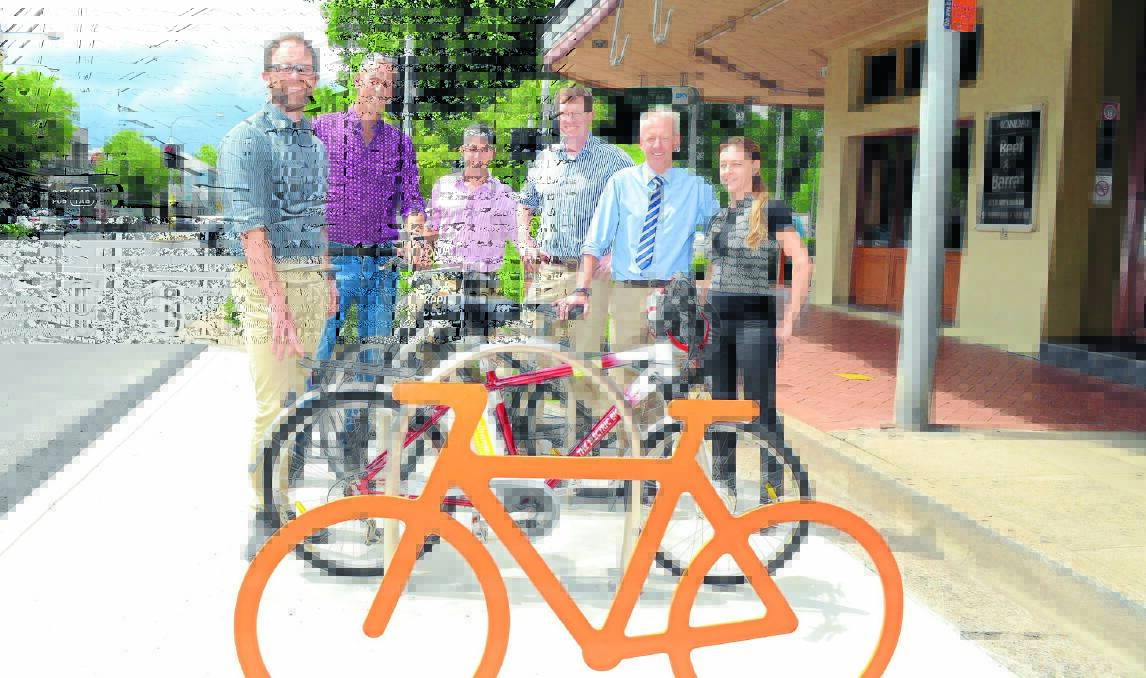 READY TO RIDE: The Bicycle Network’s Paul Walker, Nimrod’s cafe owner Nimrod Nagy, bicycling community committee chair Steve Martin, member for Orange Andrew Gee, Hotel Canobolas owner Phil Tudor and Orange City Council recreation planner Shah Alford. 
Photo: JUDE KEOGH 1113bicycle1