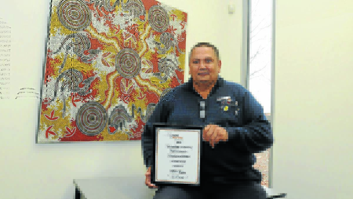 COMMUNITY LEADER: Albert Ryan was awarded TAFE Western’s Aboriginal Elder of the Year award at a ceremony on Thursday.
Photo: JUDE KEOGH 0528tafeaward1
