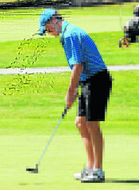 EAGLE ROCK: Duntryleague's James Conran sinks a putt on the ninth on his way to the Bathurst Junior Golf Classic title. Photo: ZENIO LAPKA 101914zconran