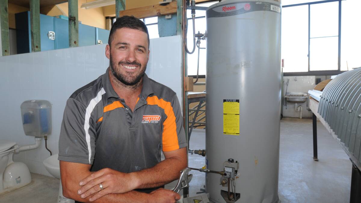 CAREER CHANGE: Ben Newsome has been awarded with a $1000 2015 Rheem Apprentice Plumber Grant to help him cover the cost of tools for his new trade and to help with travel costs from Mudgee to Orange for his course. Photo: STEVE GOSCH 1123sgapprentice1
