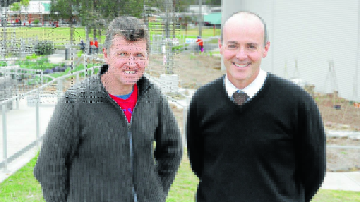 LOOKING FOR ANSWERS: Paul Owens and Orange Anglican Grammar School principal Len Elliott are looking forward to tackling the world’s big issues as part of Christianity Explored. Photo: MEGAN FOSTER  
