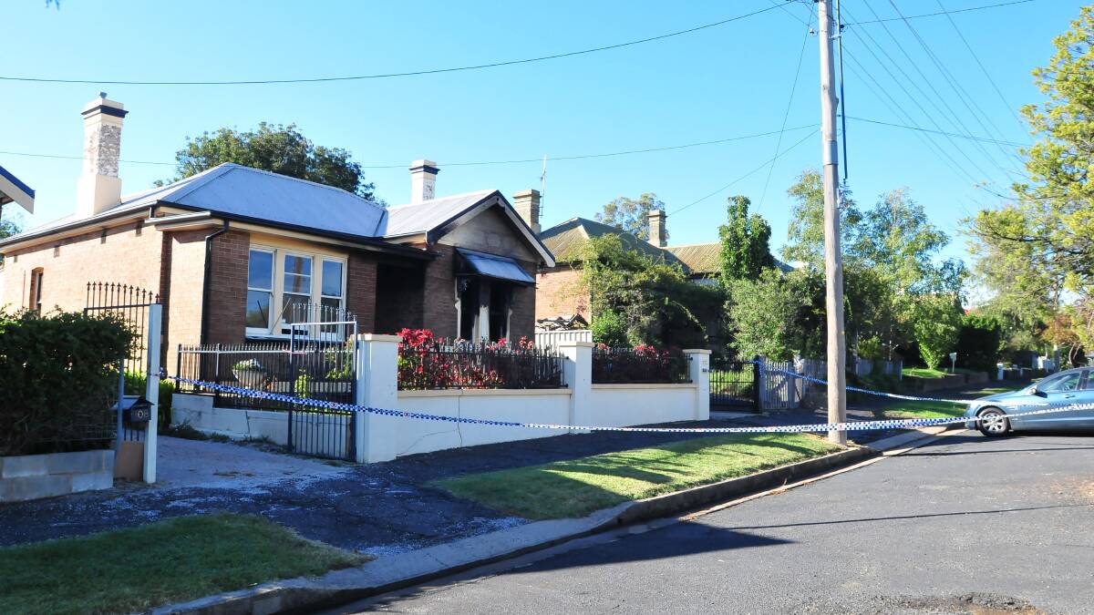 SET ALIGHT: The house in Clinton St. 0319fire3