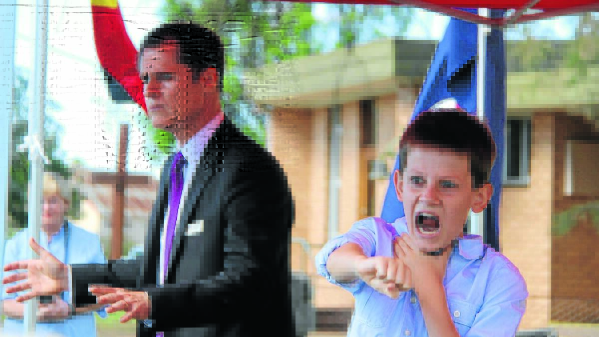 READY TO RECITE: Dubbo mayor Mathew Dickerson and his son Andy will recite The Man from Ironbark at the Australian Poetry Competition today in a mayoral battle against Orange mayor John Davis. 
Photo: SUPPLIED 0213poetry1