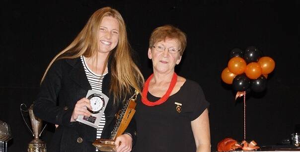 BEST OF THE BEST: Chloe Barrett receives her women's sportsperson of the year award from Sue Hope. 