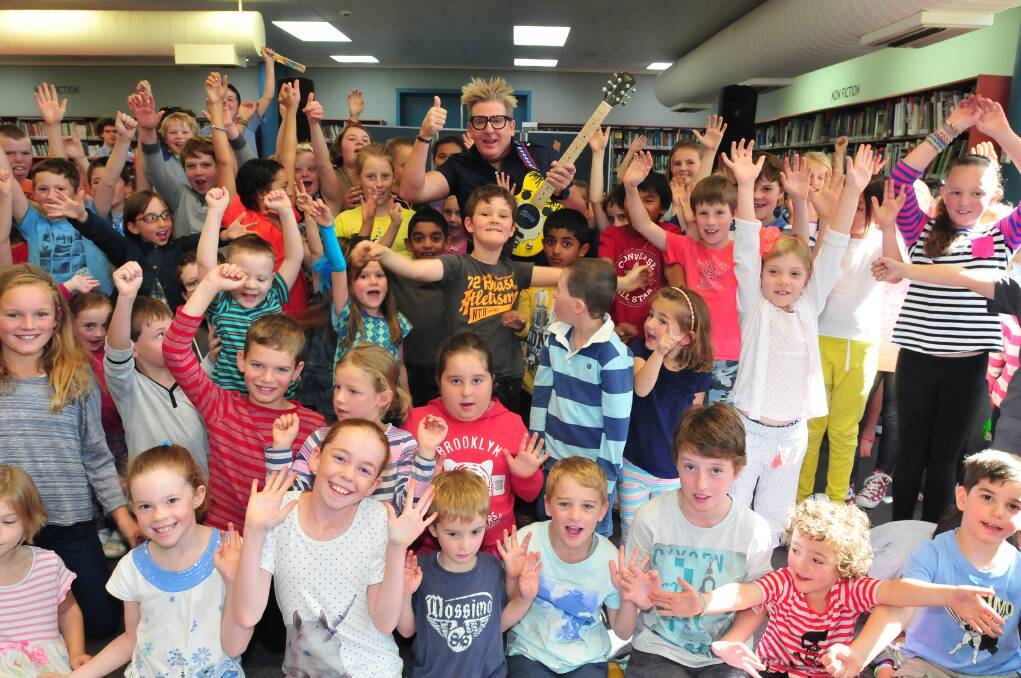 JUST FOR LAUGHS: Children’s entertainer Andy Jones brought his What’s a Joke? show to Orange yesterday, teaching a roomful of kids about humour and comedy. 
Photo: JUDE KEOGH 0424andy2 