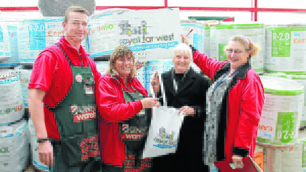CARING FOR KIDS: Bunnings’ Jason Bootsman, Sue Rodwell, and Royal Far West Orange branch’s Carol Trott and Beryle Conran draw the winning ticket for the mid-year raffle.
Photo: JEFF DEATH 0725jdfarwest01
