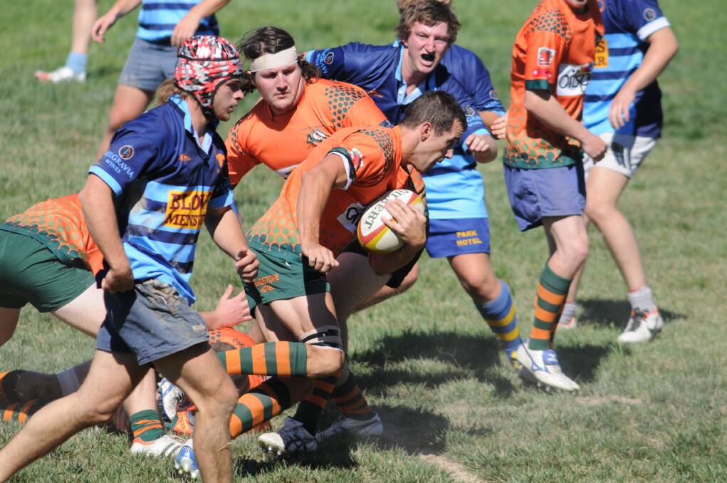 PICK AND DRIVE: Orange City's Mitchell Pearce spots a gap and makes a beeline for it in Sunday’s trial against Central West under 20s. Photo: STEVE GOSCH                                                                                                                                                                                                                                                                      0223sgrugby2