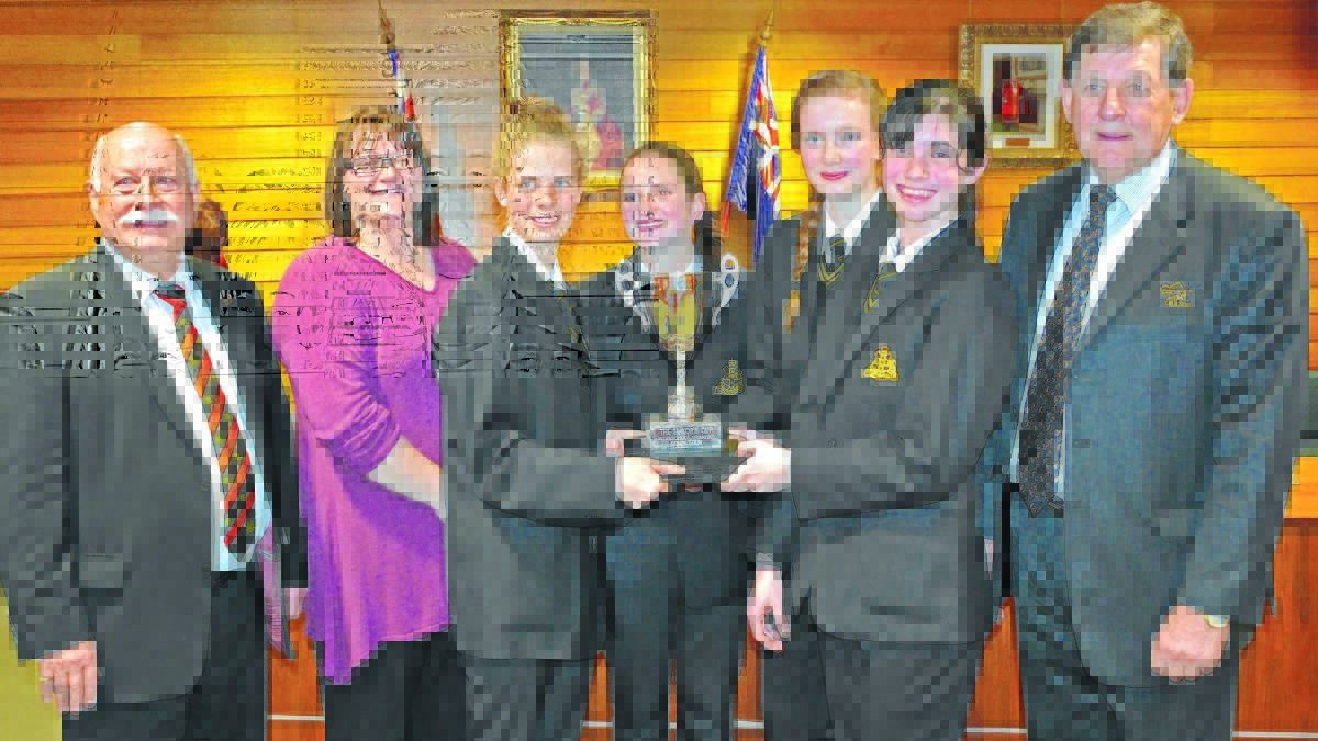awesome foursome: Orange High School debating team members Freya Hawke, Alexandra Boyd, Eleanor Delaney and Isabella Bankovic with Orange deputy mayor Chris Gryllis, OHS teacher Kristy Hilton  and councillor Reg Kidd after the Mayor's Cup debating competition final.
 Photo SUPPLIED