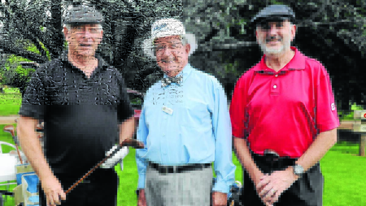 STEP BACK IN TIME: Golfers Mick Doyle, Tom Moore and Hugh Johnson with the hickory sticks used at Duntryleague yesterday. Photo: STEVE GOSCH                                      0213sggolf2