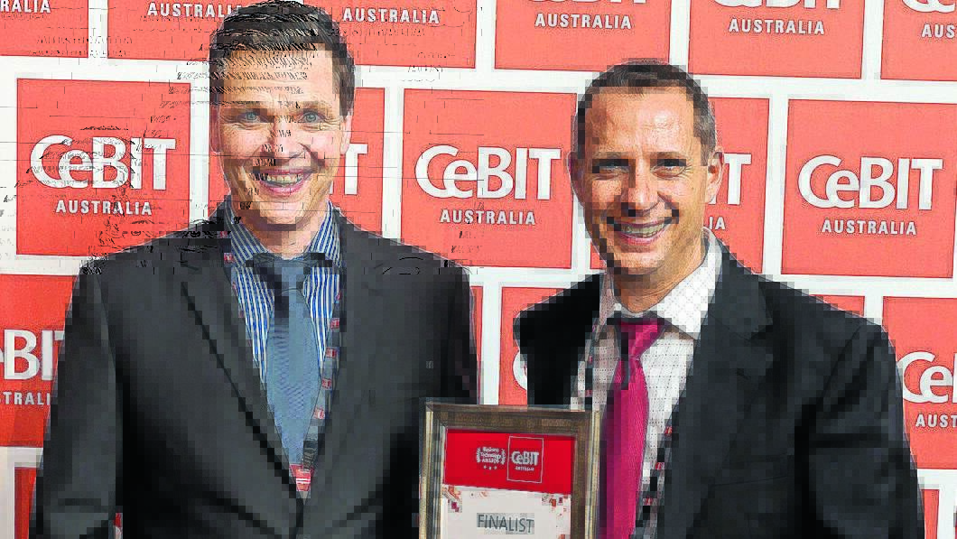 RECOGNITION: YourLink’s Rick Hollingworth and Richard Scenna have been recognised for their development of a smartphone application that helps connect senior citizens with friends, family and the community. Photo: CONTRIBUTED                                           0513yourlink