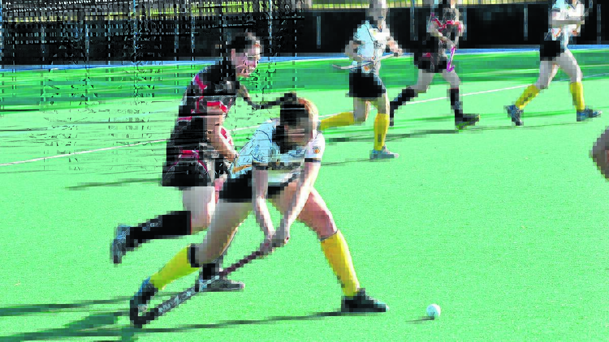 STAR PLAYER: Madie Smith was one of Kinross-CYMS' best last weekend. After a tumultuous week she will be crucial in today's clash against St Pat's. 
Photo: MARK LOGAN 0511mlhockey12